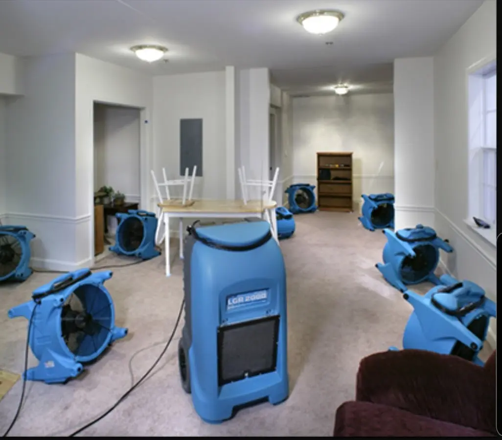 Air movers and dehumidifier setup for Water Extraction & Removal in Bow